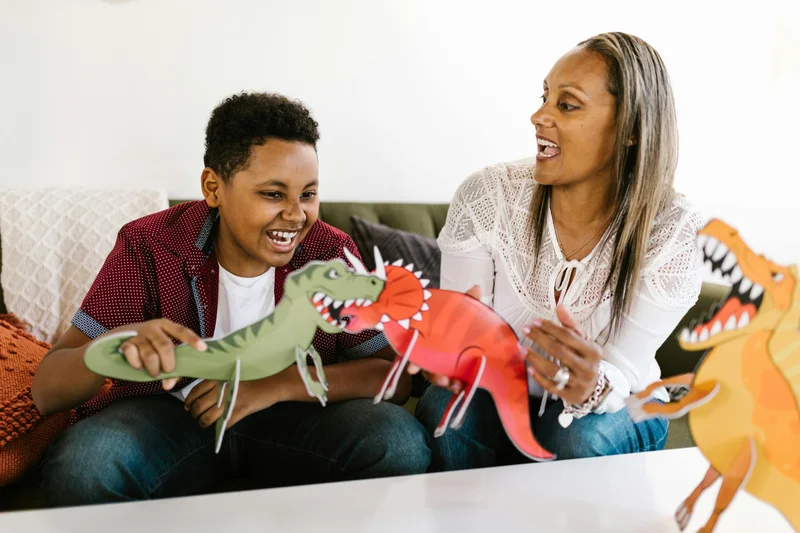 Parent and child bonding during homeschool craft activity