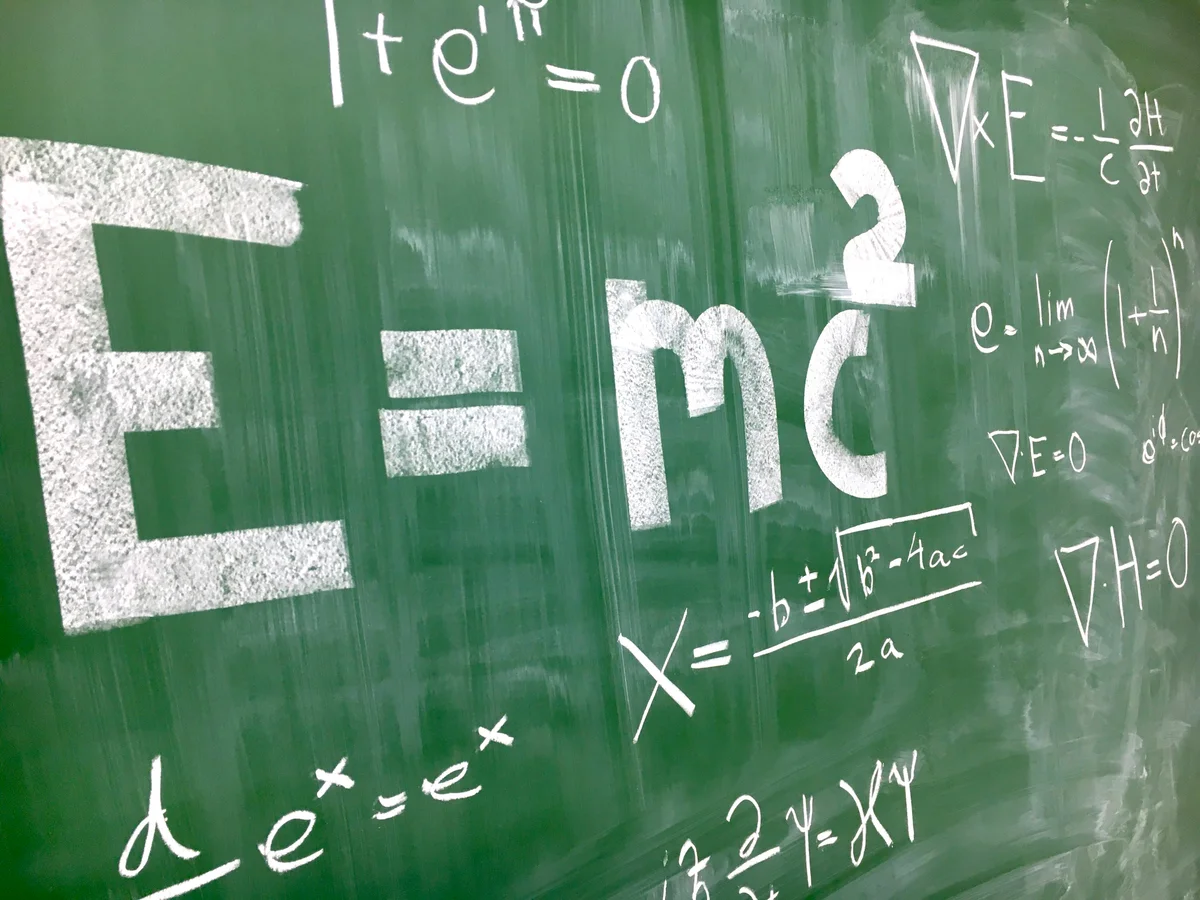 Best physics curriculum for homeschool - physics equations on chalkboard