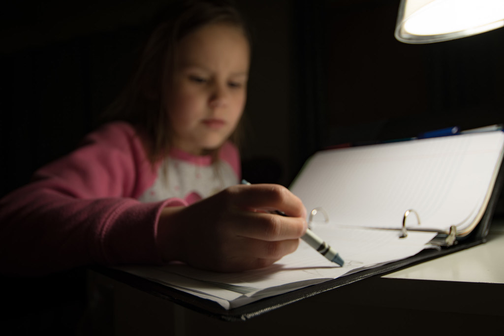 Student writing word lists representing Sequential Spelling daily practice